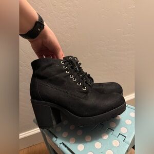 Black lace-up heeled ankle boots